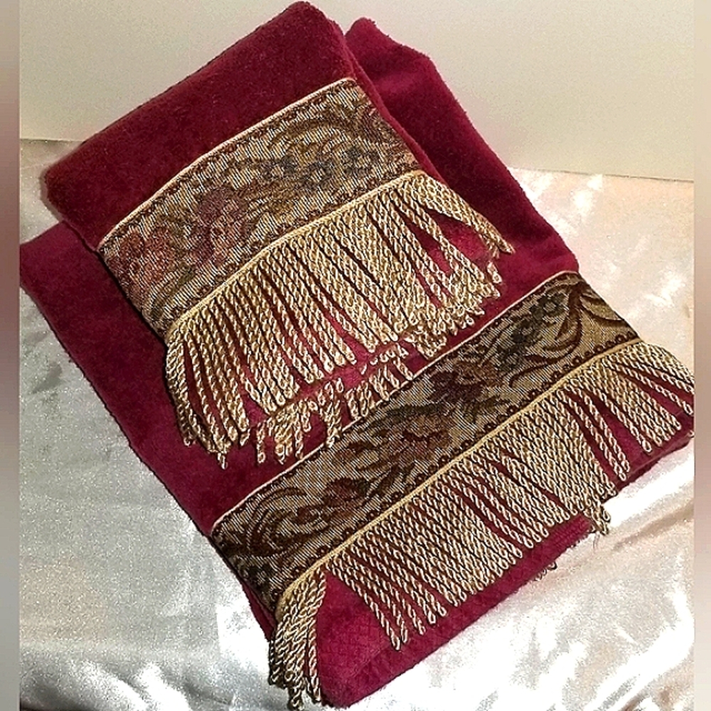 Avanti vintage towels for bathroom. Wine with jacquard & gold tassel trim.
